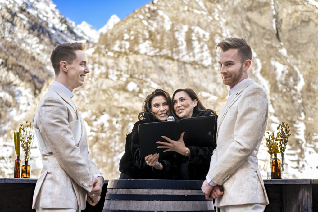 Matt and Brady exchanging vows in an intimate destination wedding ceremony at Cervo Resort in Zermatt, Switzerland surrounded by the stunning Swiss Alps