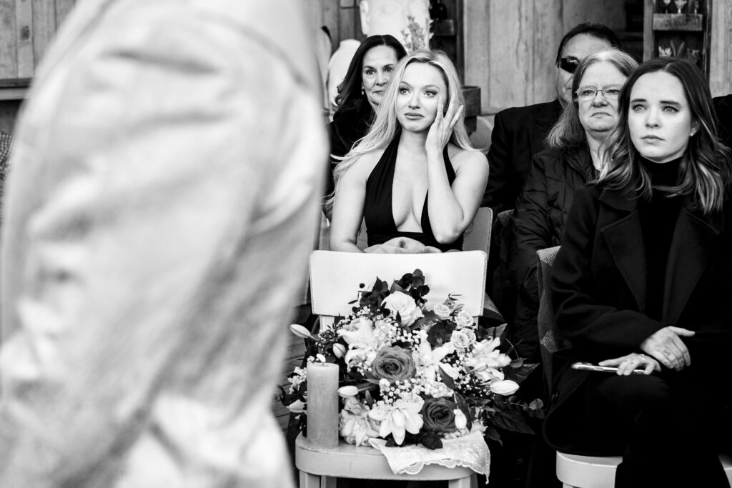 Matt and Brady exchanging vows in an intimate destination wedding ceremony at Cervo Resort in Zermatt, Switzerland surrounded by the stunning Swiss Alps