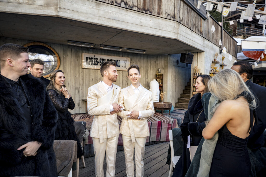 Matt and Brady exchanging vows in an intimate destination wedding ceremony at Cervo Resort in Zermatt, Switzerland surrounded by the stunning Swiss Alps