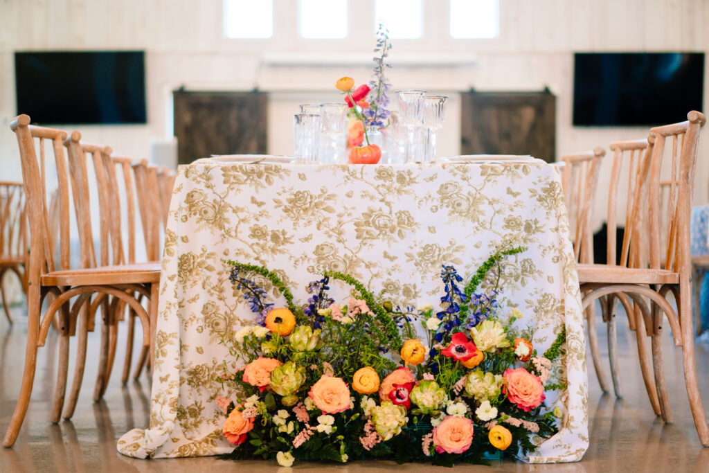 Table display with colorful florals and rentals at One Preston Events Open House