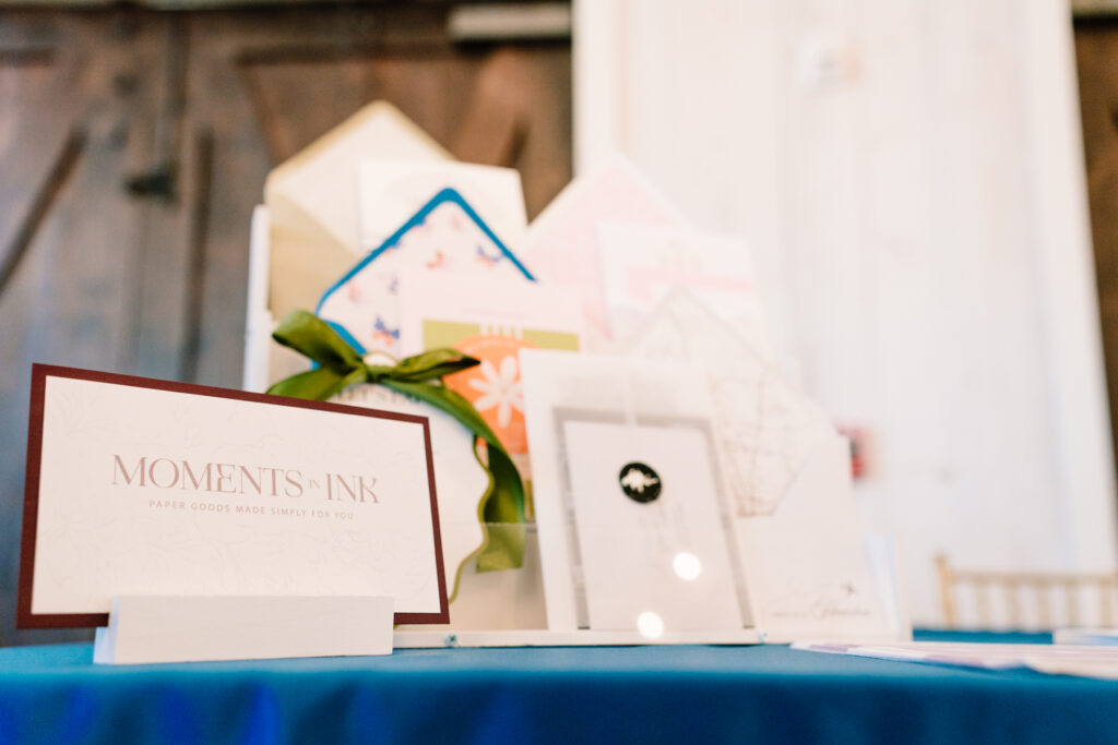 One Preston Events wedding venue open house giveaway setup with modern décor