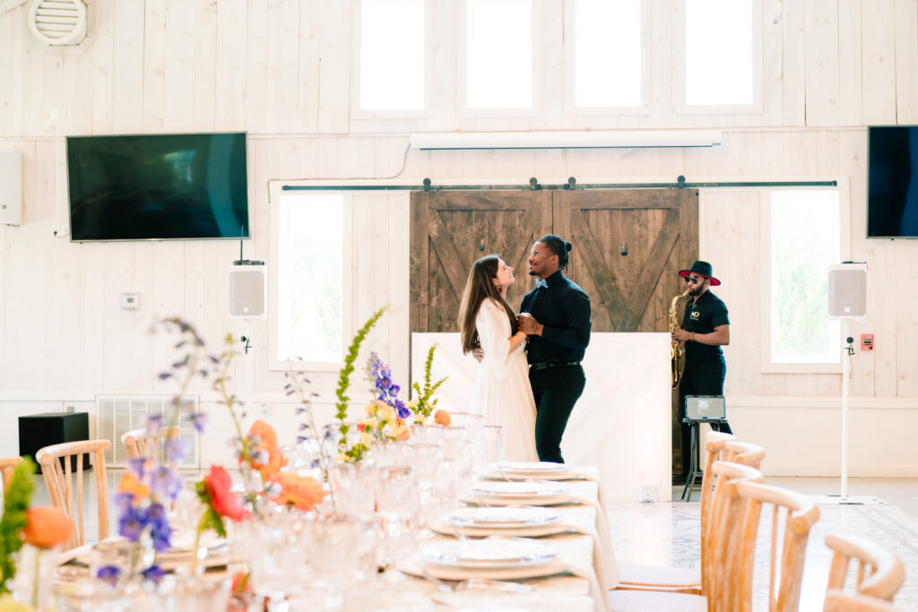 Guests enjoying live music and cocktails at One Preston Events wedding open house