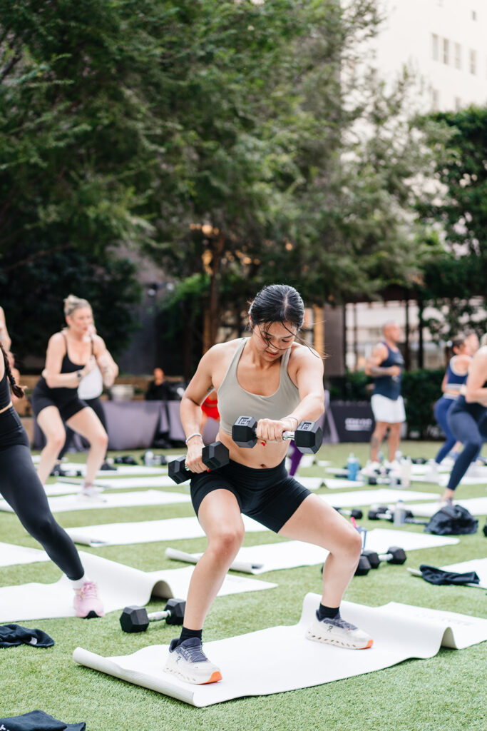 Guests moving together during a sunrise workout at The Joule Hotel Dallas
