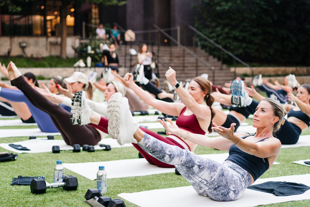 Brittany of Stay Fit Virtual leading 65 guests at The Joule Hotel’s Eye installation in Downtown Dallas