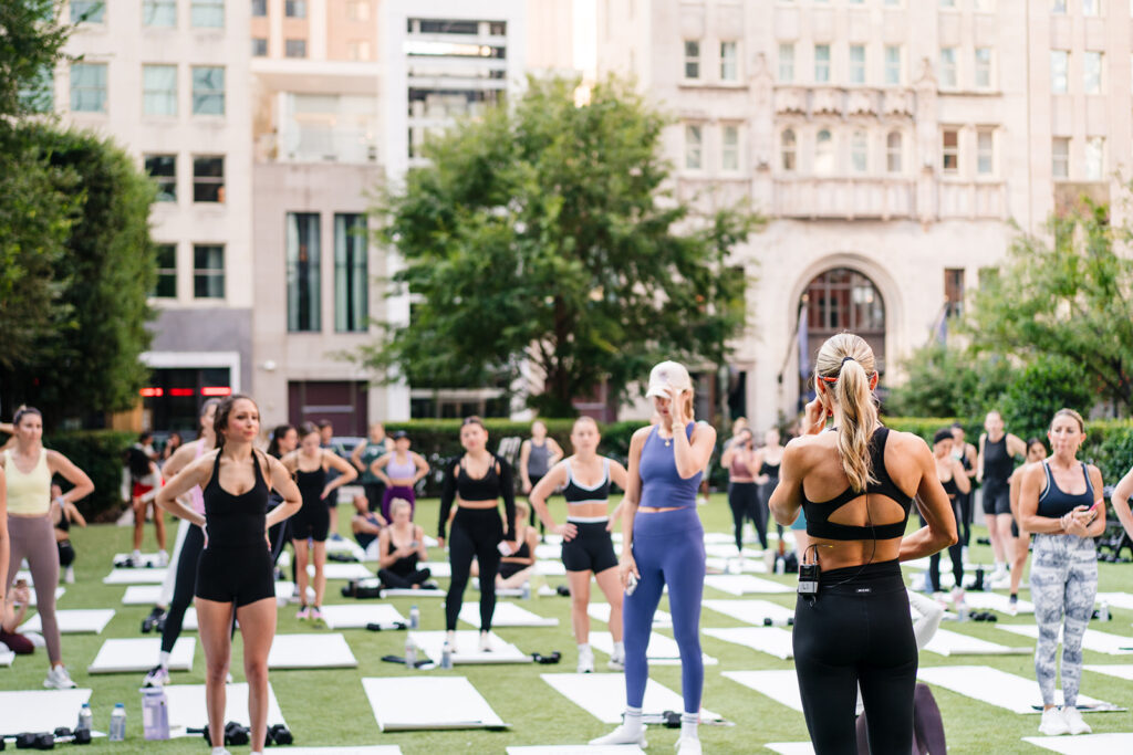 Brittany of Stay Fit Virtual leading 65 guests at The Joule Hotel’s Eye installation in Downtown Dallas
