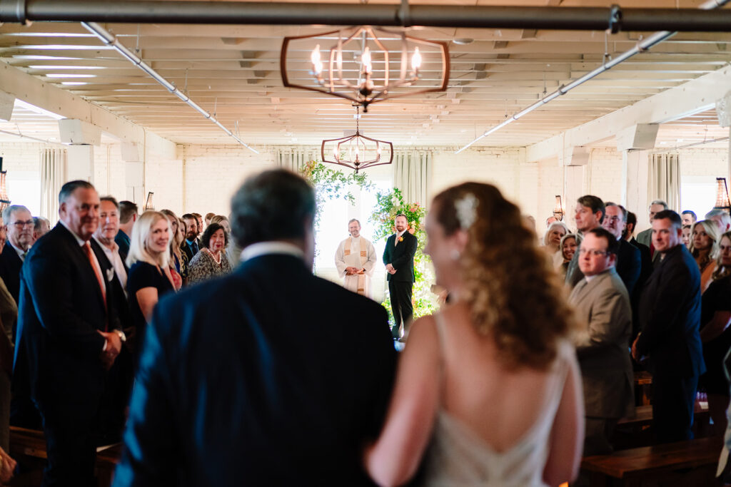wedding ceremony at Brik Venue in Fort Worth by DFW Wedding Photographers The MacMeekens