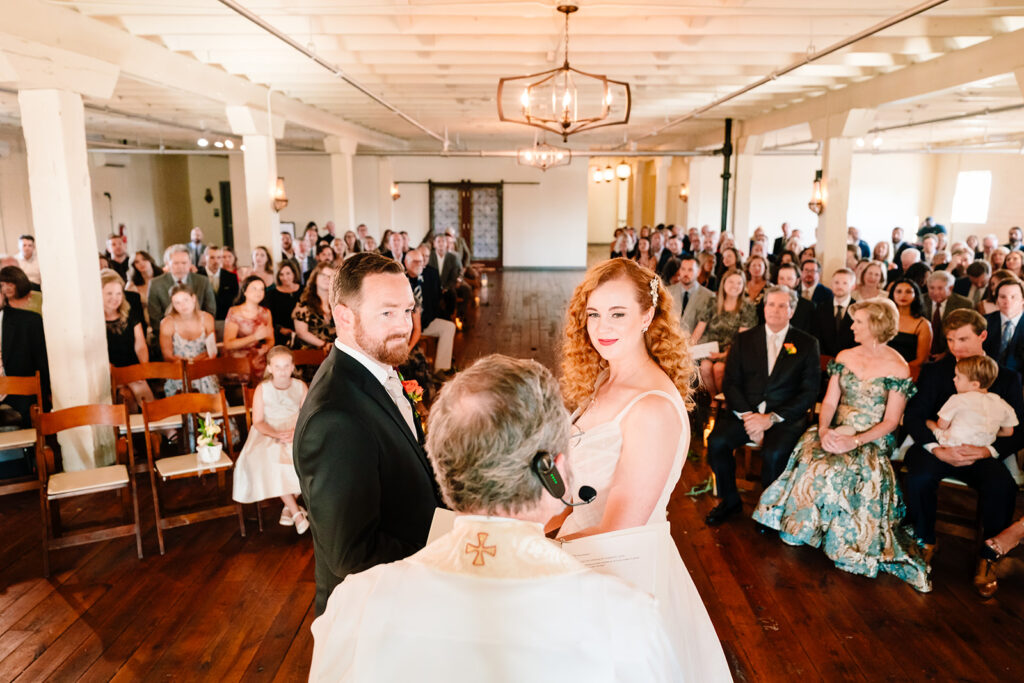 wedding ceremony at Brik Venue in Fort Worth by DFW Wedding Photographers The MacMeekens