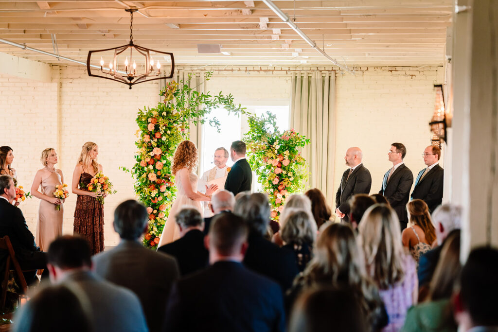 wedding ceremony at Brik Venue in Fort Worth by DFW Wedding Photographers The MacMeekens