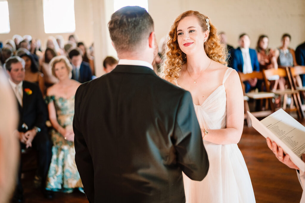 wedding ceremony at Brik Venue in Fort Worth by DFW Wedding Photographers The MacMeekens