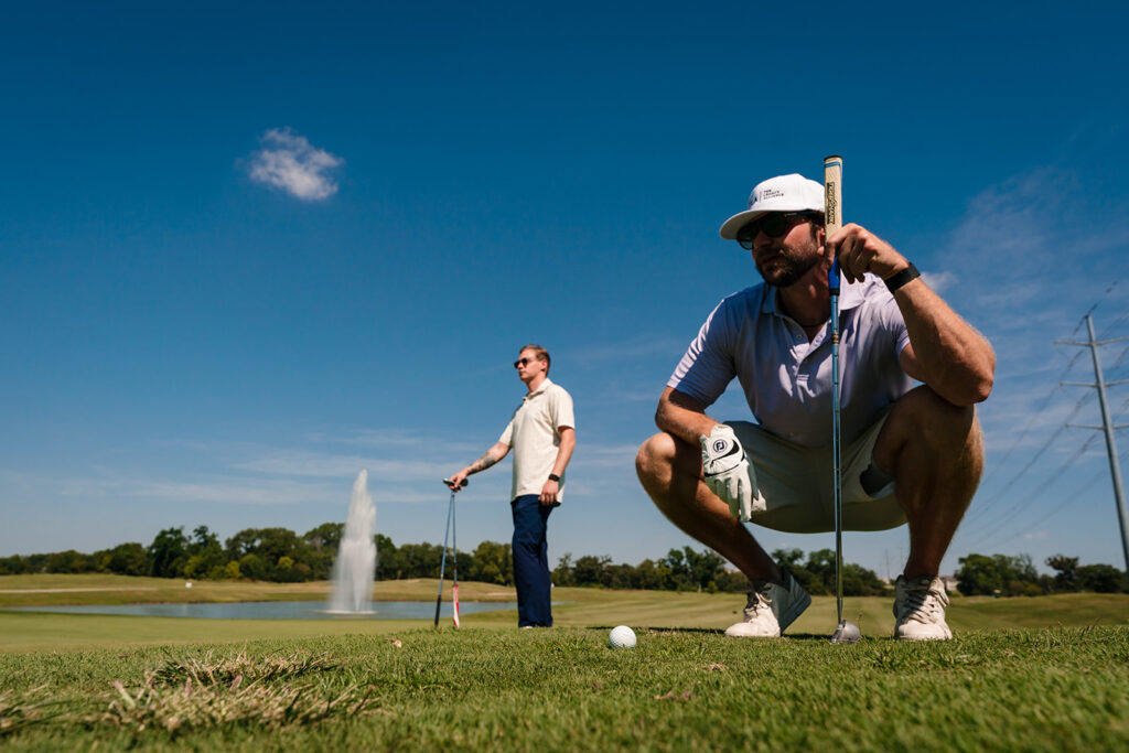 Groom Playing Golf with Groomsmen before wedding in McKinney, TX
