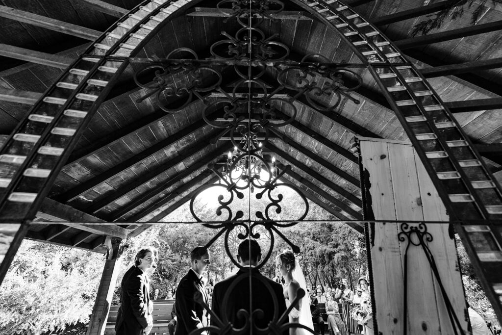 Avalon Legacy Ranch Bride and Groom During Wedding Ceremony by McKinney Wedding Photographers