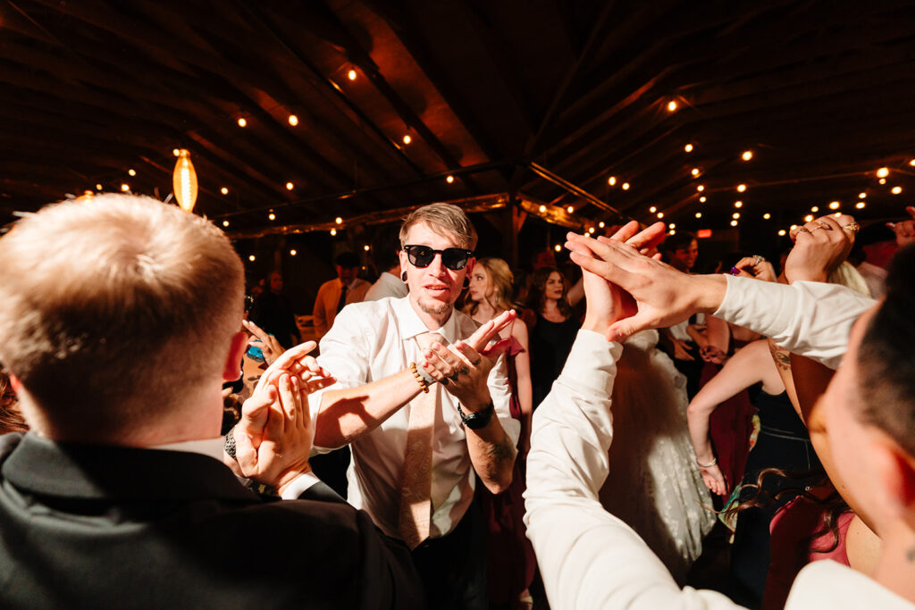 Bride and Groom Wedding Reception at Avalon Legacy Ranch in Mckinney by DFW Wedding Photographers The MacMeekens