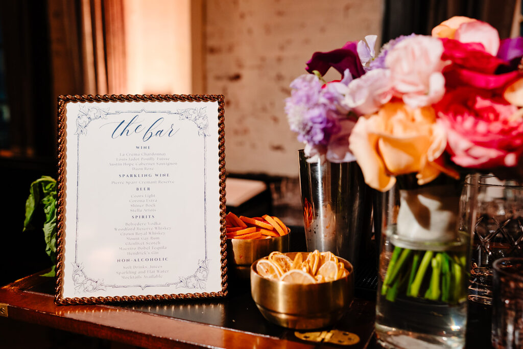 Reception Decor Details on Wedding Day by Wedfully Yours Floral and Turn the Paige Event Wedding Planner at The Mason Dallas by DFW Wedding Photographers The MacMeekens