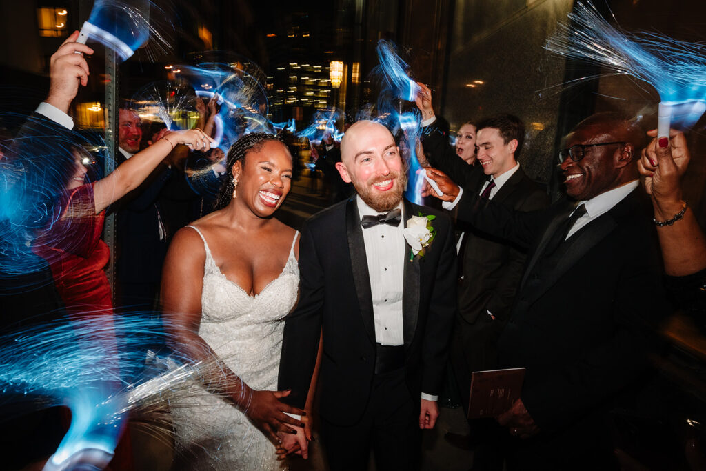 bride and groom final exit leaving wedding reception at The Carlisle Room