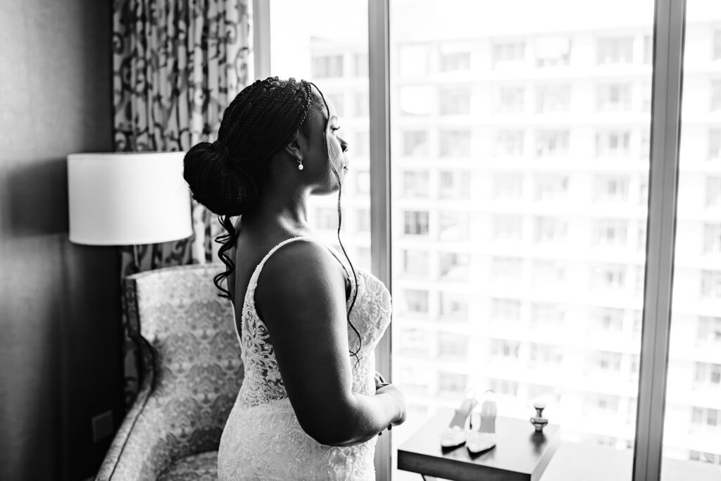 Bride getting ready with bridesmaids at The Fairmont Dallas on her North Texas wedding day