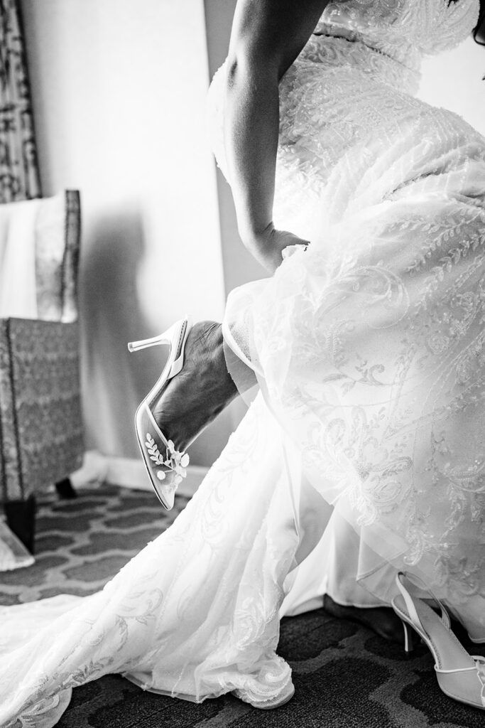 Bride getting ready with bridesmaids at The Fairmont Dallas on her North Texas wedding day