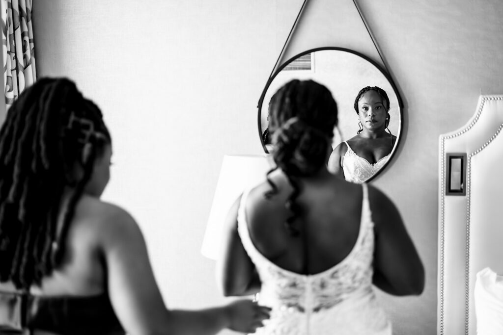 Bride getting ready with bridesmaids at The Fairmont Dallas on her North Texas wedding day