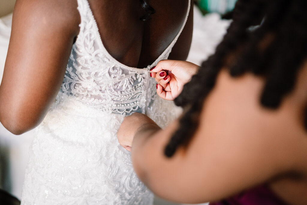 Bride getting ready with bridesmaids at The Fairmont Dallas on her North Texas wedding day