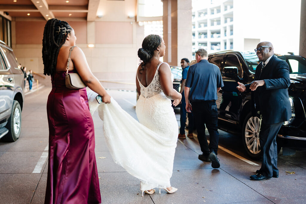 Bride getting ready with bridesmaids at The Fairmont Dallas on her North Texas wedding day