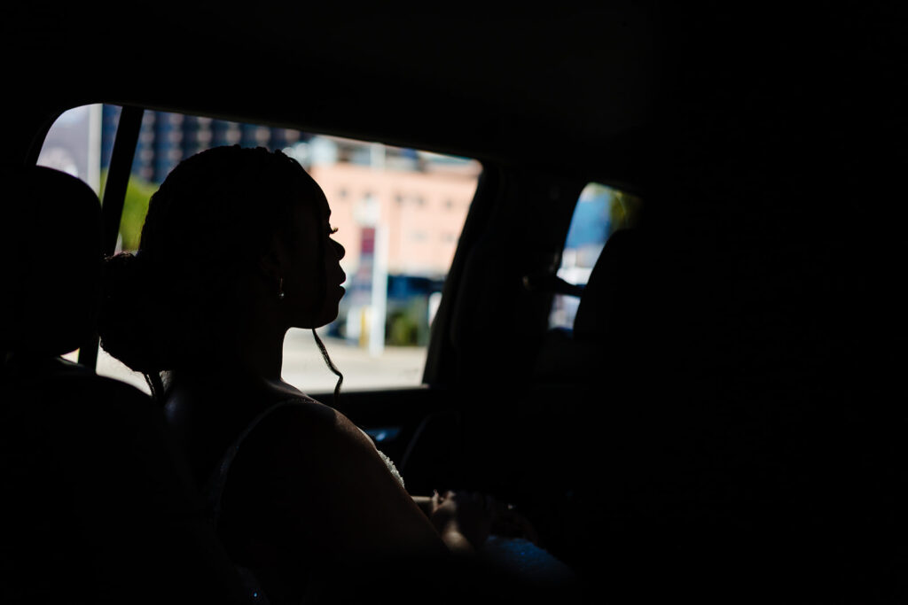Bride getting ready with bridesmaids at The Fairmont Dallas on her North Texas wedding day