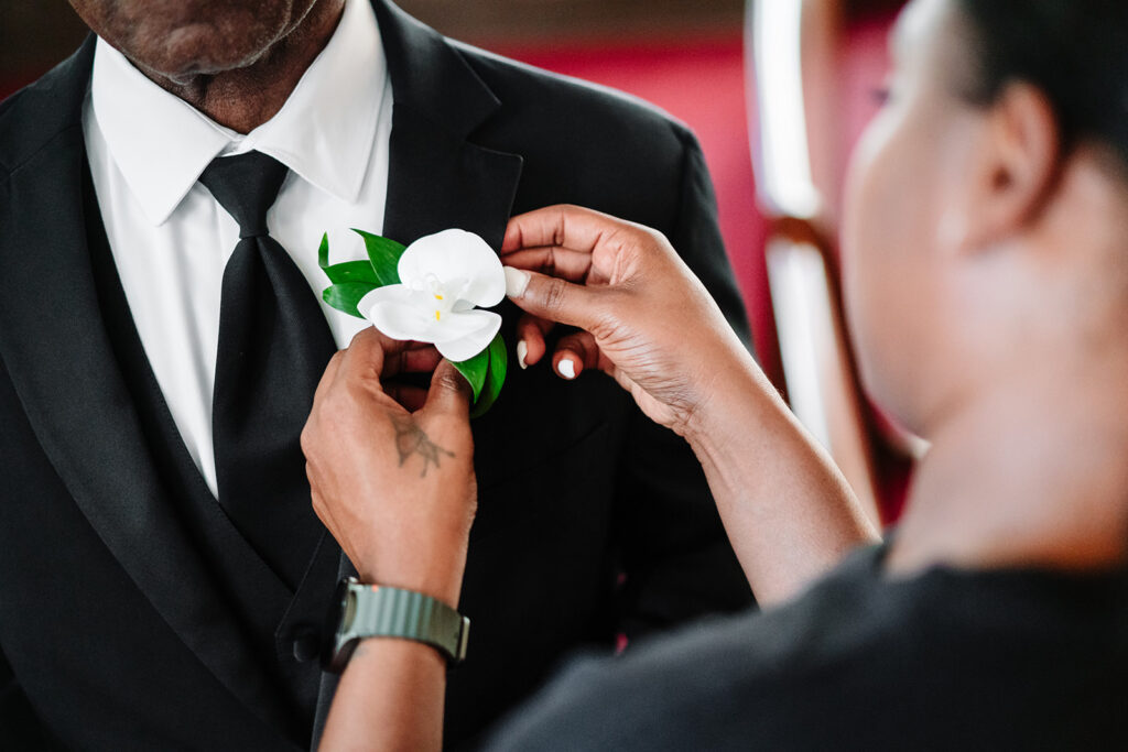 Father of the bride preparing for emotional first look with daughter on her wedding day