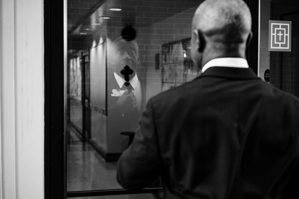 Father of the bride preparing for emotional first look with daughter on her wedding day