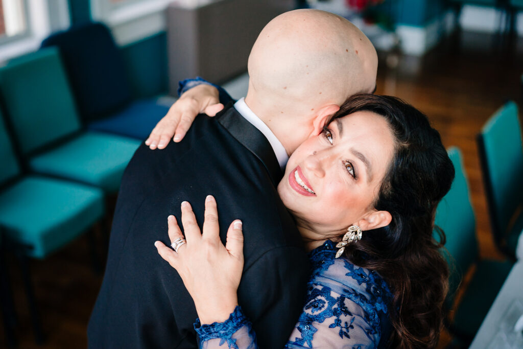 Groom embracing his mom before Tyler Street Church ceremony