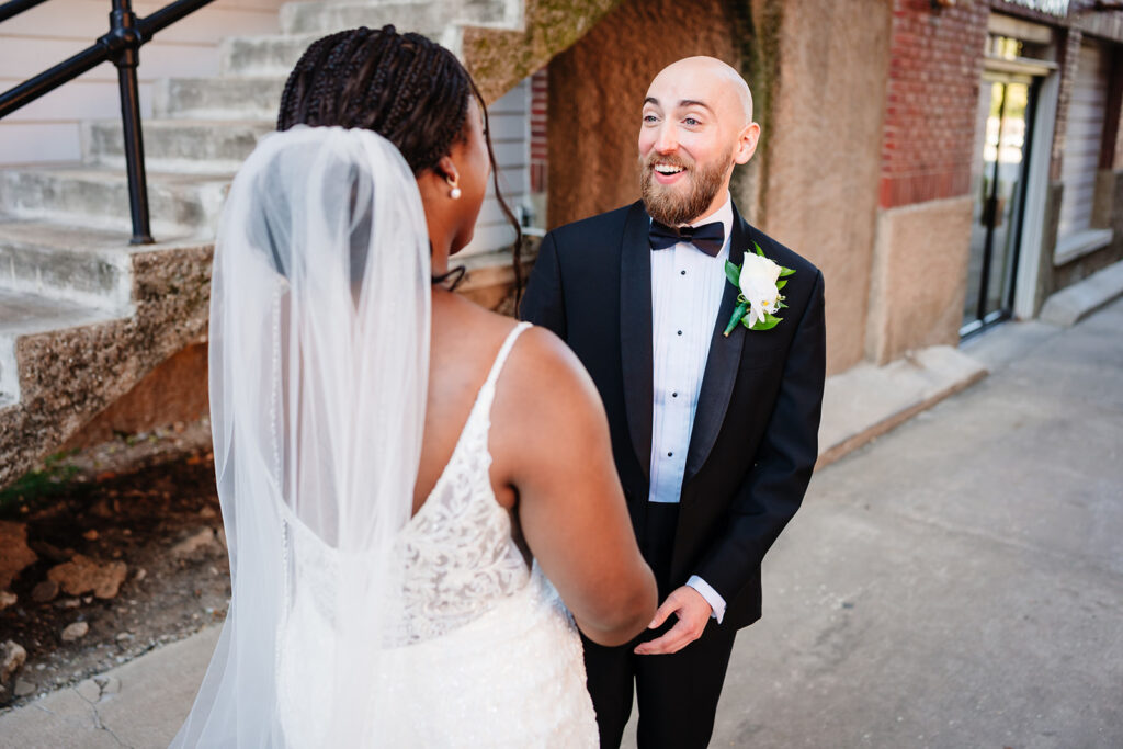 Emotional first look between Ashley and Tom on their Dallas wedding day