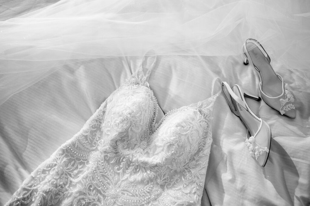 Bride getting ready with bridesmaids at The Fairmont Dallas on her North Texas wedding day