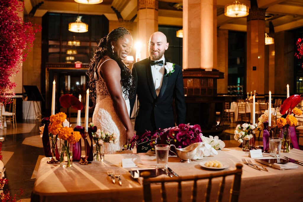 Bride and groom seeing their wedding reception decor for the first time at The Carlisle Room
