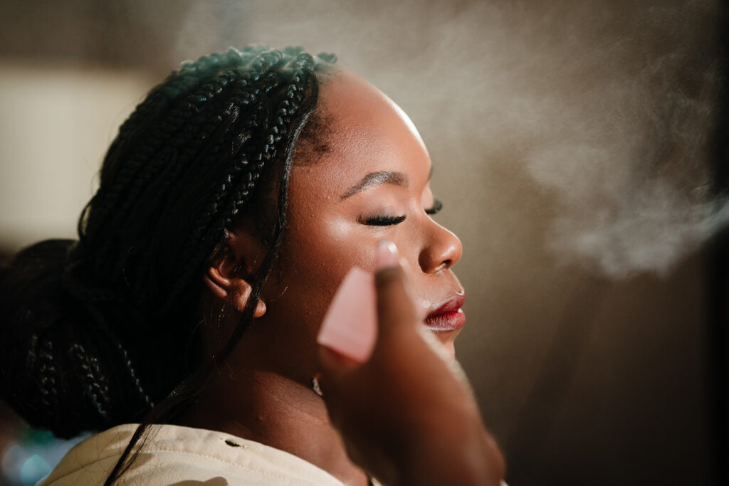 Bridal makeup being applied during wedding morning at The Fairmont Hotel Dallas