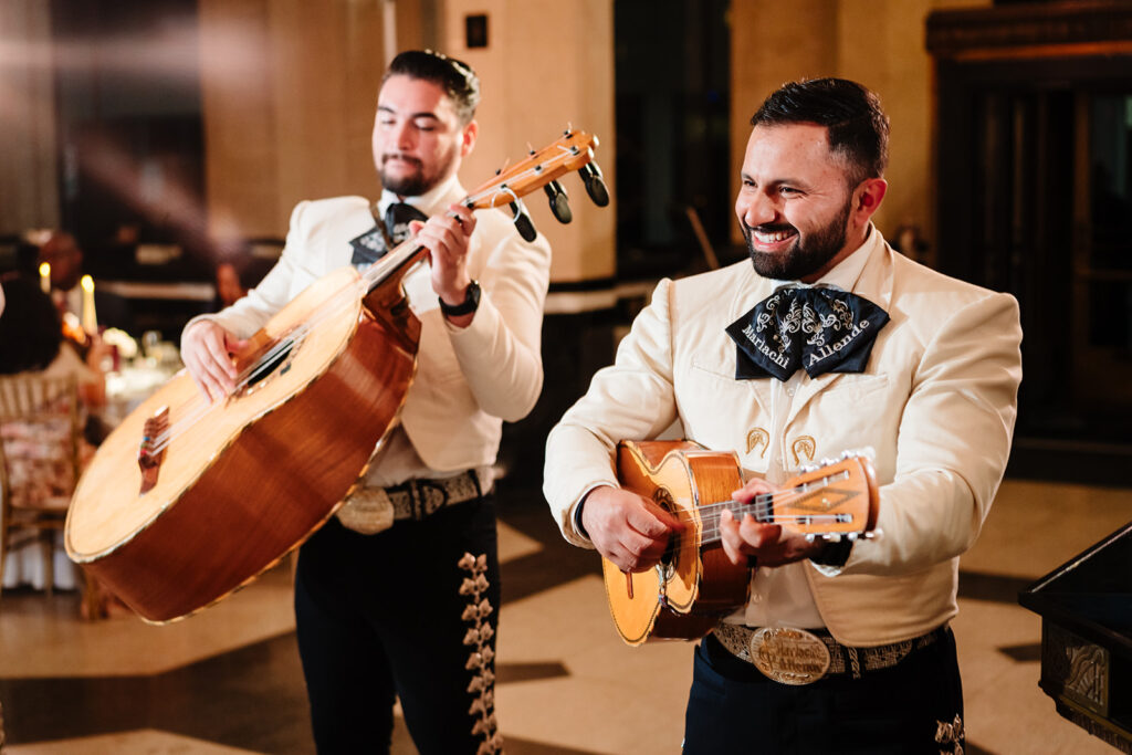 Mariachi band playing during cultural fusion wedding reception at The Carlisle Room in Dallas