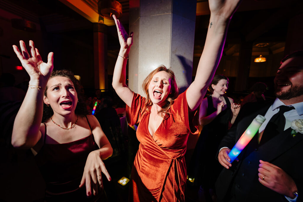 Wedding guests dancing during reception at The Carlisle Room in Dallas