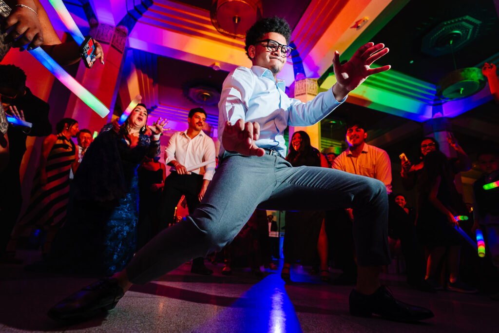 Wedding guests dancing during reception at The Carlisle Room in Dallas