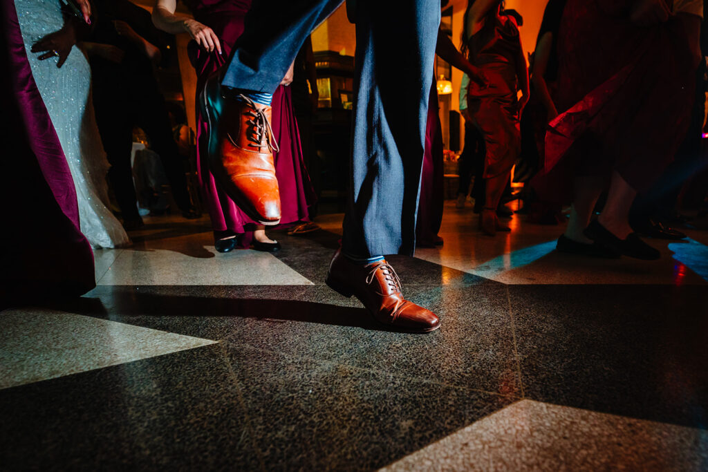Wedding guests dancing during reception at The Carlisle Room in Dallas