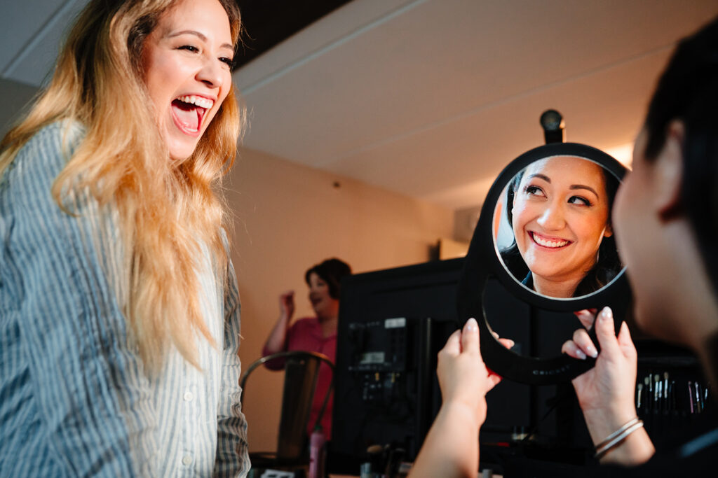 April preparing for her wedding day with bridesmaids in Richardson