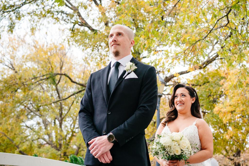 April and Nate sharing their first look before their Plano wedding