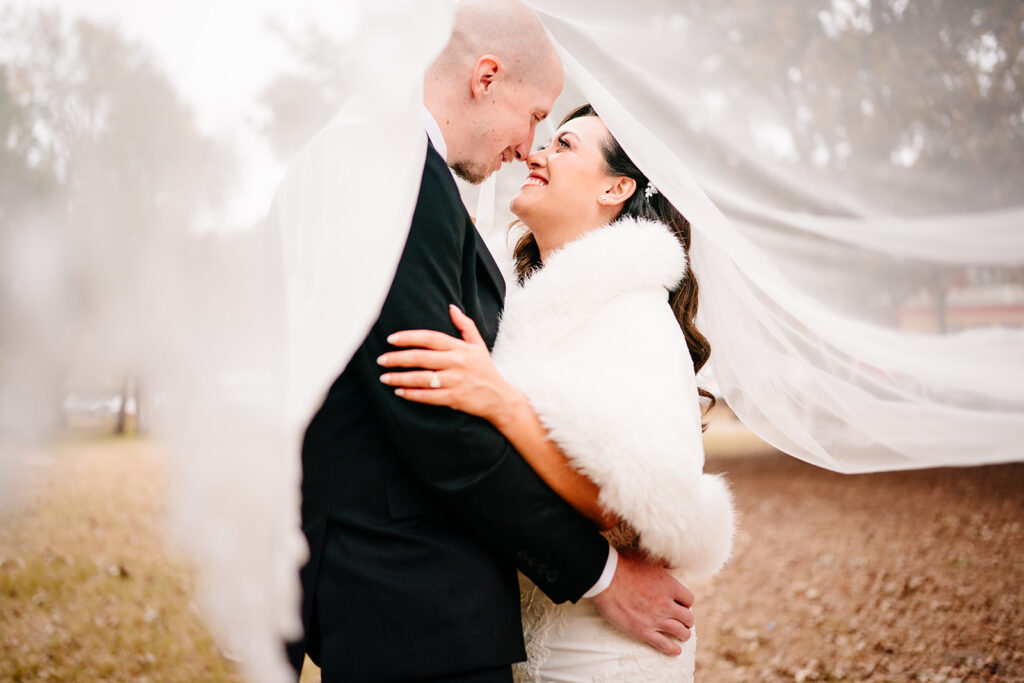 April and Nate during relaxed wedding portraits in Plano