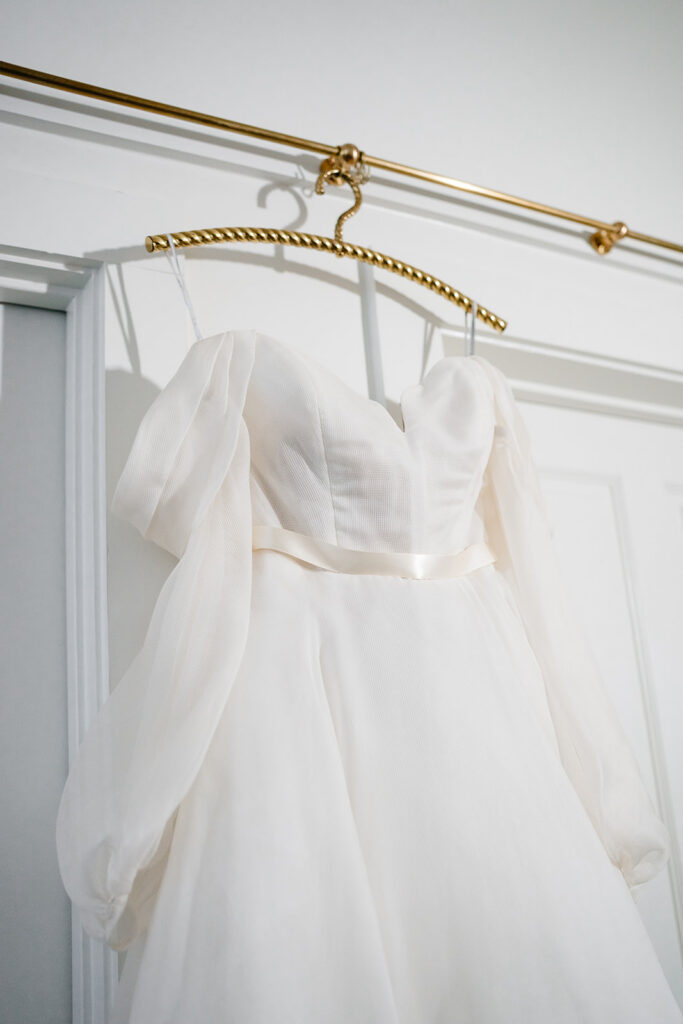 Andrea getting ready for wedding at HIstoric Frankford Chapel in Dallas by autism friendly wedding photographers the macmeekens