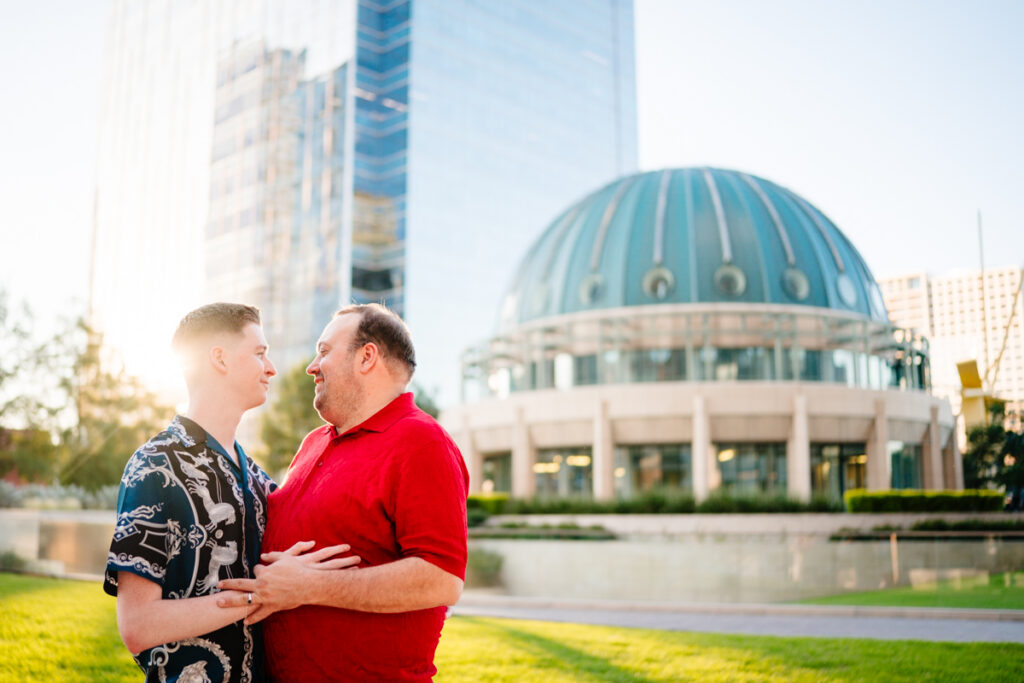 Queer Dallas Engagement Session with Cinematic Skyline Views at Margaret Hunt Hill Bridge
