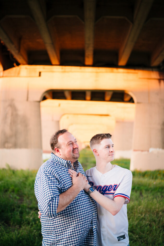 Queer Dallas Engagement Session with Cinematic Skyline Views at Margaret Hunt Hill Bridge