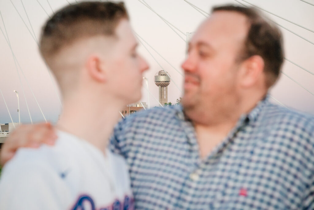 Queer Dallas Engagement Session with Cinematic Skyline Views at Margaret Hunt Hill Bridge