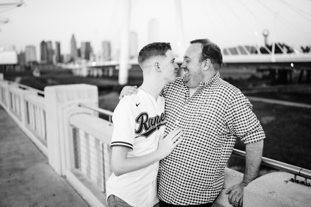 Queer Dallas Engagement Session with Cinematic Skyline Views at Margaret Hunt Hill Bridge