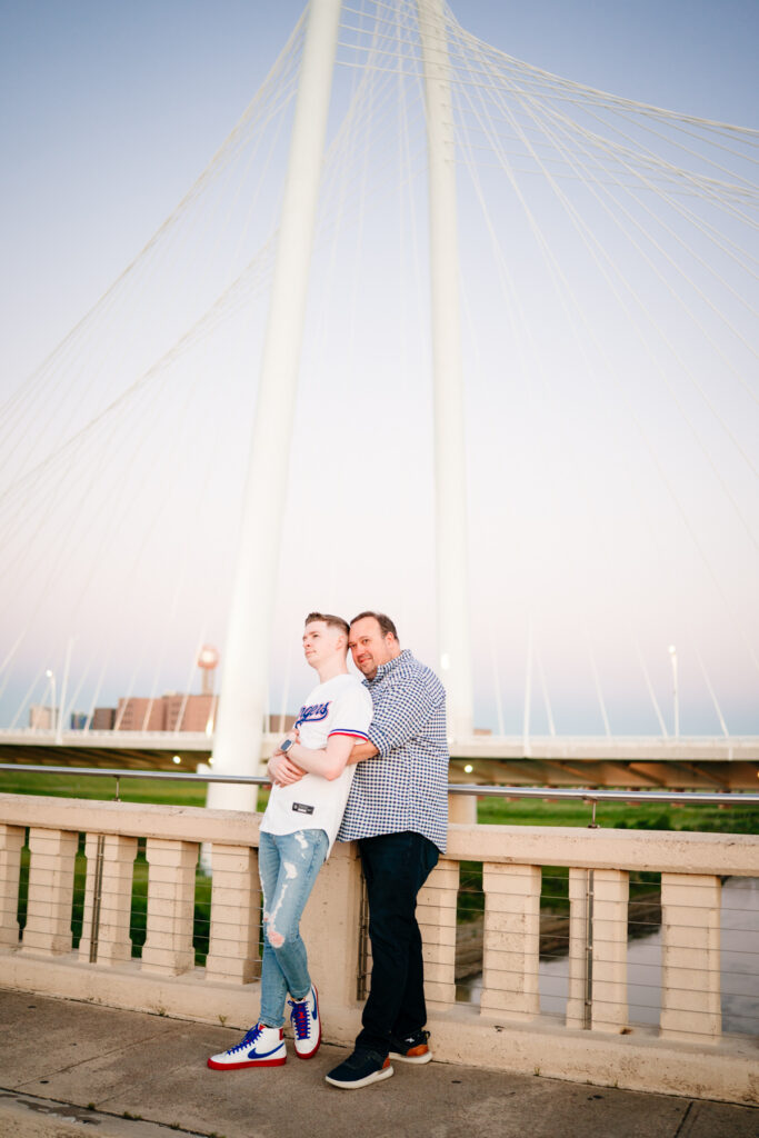 Queer Dallas Engagement Session with Cinematic Skyline Views at Margaret Hunt Hill Bridge