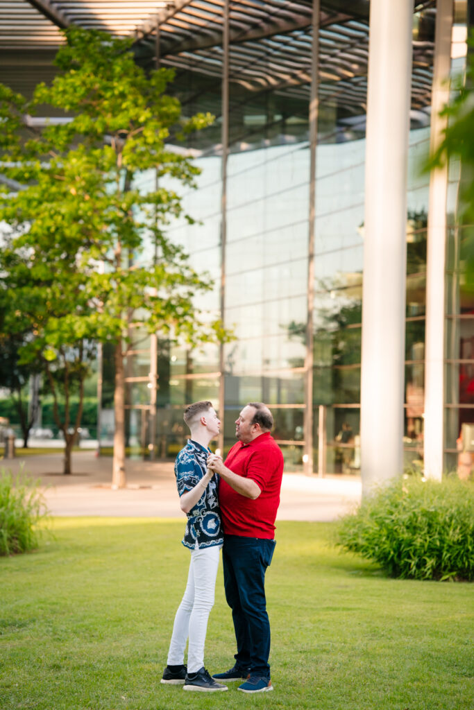 Queer Dallas Engagement Session with Cinematic Skyline Views at Margaret Hunt Hill Bridge