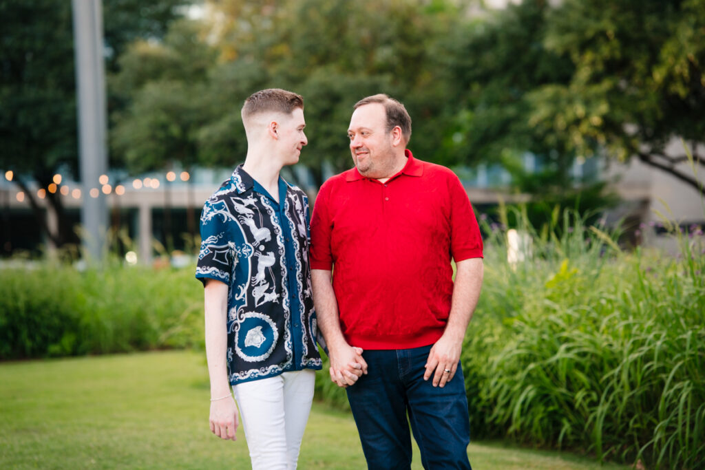 Queer Dallas Engagement Session with Cinematic Skyline Views at Margaret Hunt Hill Bridge