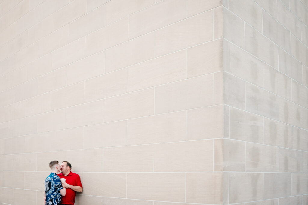 Queer Dallas Engagement Session with Cinematic Skyline Views at Margaret Hunt Hill Bridge
