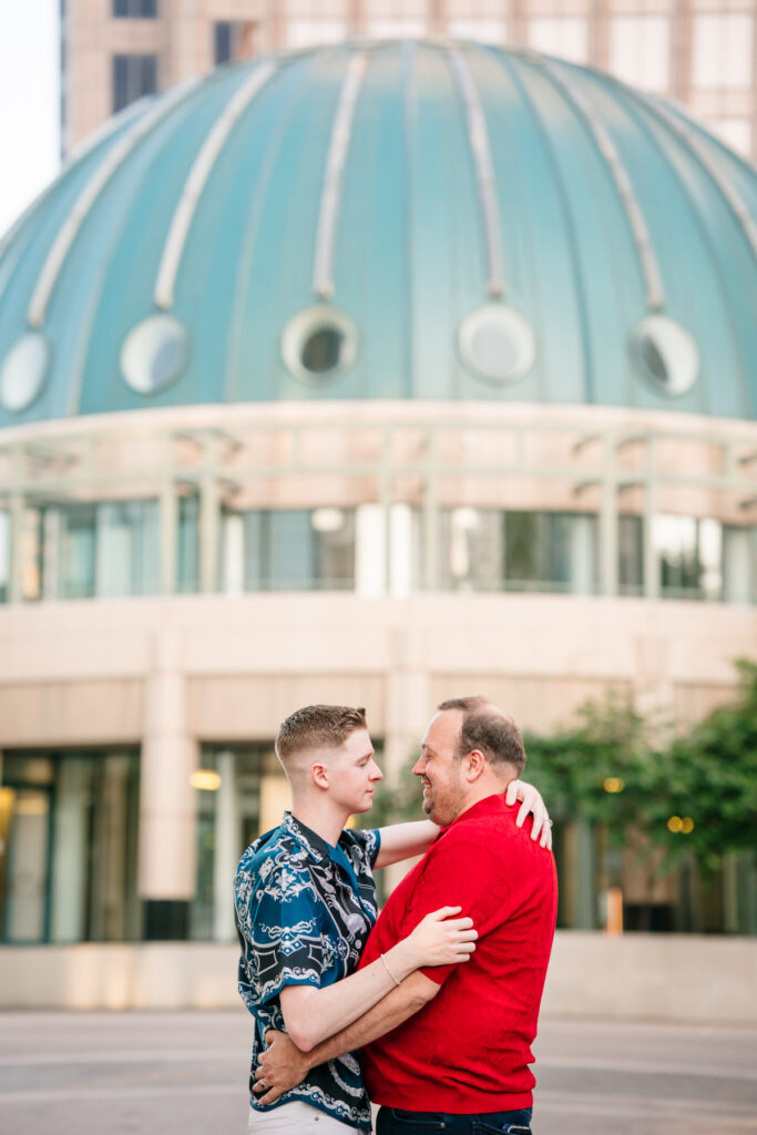 Queer Dallas Engagement Session with Cinematic Skyline Views at Margaret Hunt Hill Bridge