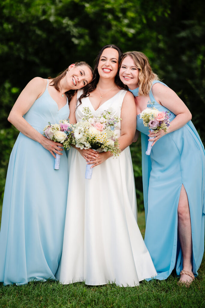 Bride and Bridesmaids Portraits during North Texas LGBTQ Wedding at The Filter Building on White Rock Lake by Dallas Inclusive Wedding Photographers