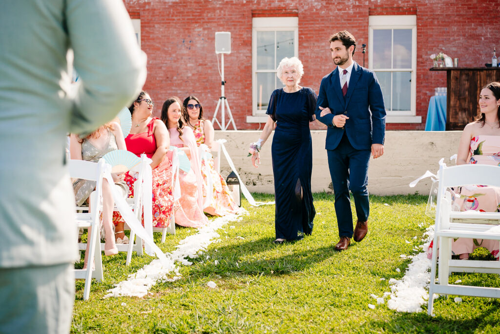 North Texas LGBTQ Wedding Ceremony at The Filter Building on White Rock Lake by Dallas Inclusive Wedding Photographers